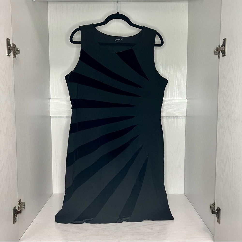 Black sleeveless dress with velvet accent design